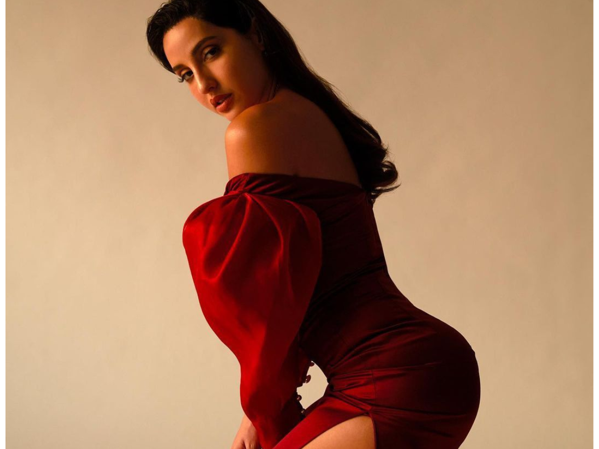 नोरा फतेही की इन तस्वीरों ने बढ़ाई जून की गर्मी , इंटरनेट पर मचा रही हैं धमाल - Photo Gallery