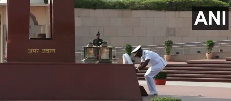 Kenya's Navy Commander Major General Paul Owuor Otieno pays tributes at the National War Memorial