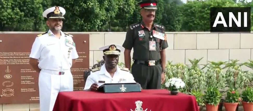Kenya's Navy Commander Major General Paul Owuor Otieno pays tributes at the National War Memorial